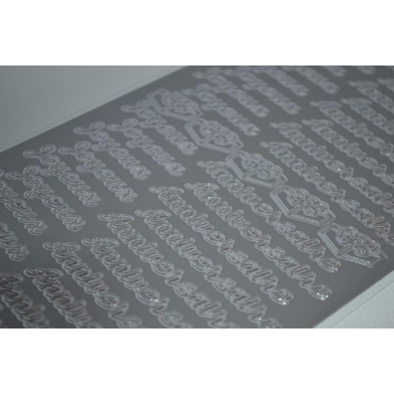 Planche stickers Peel Off Ecritures Argentées Joyeux Anniversaire fond Argenté Mat (10 cm x 23 cm) Planche stickers Peel Off Ecritures Argentées Joyeux Anniversaire fond Argenté Mat (10 cm x 23 cm)