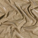 Tissu Jersey Lurex Pailleté sur fond Or - Par 10 cm/140