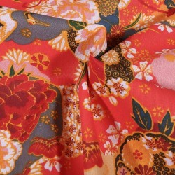 Tissu Coton imprimé Fleurs Japonaises fond Corail vendu Par 10 cm